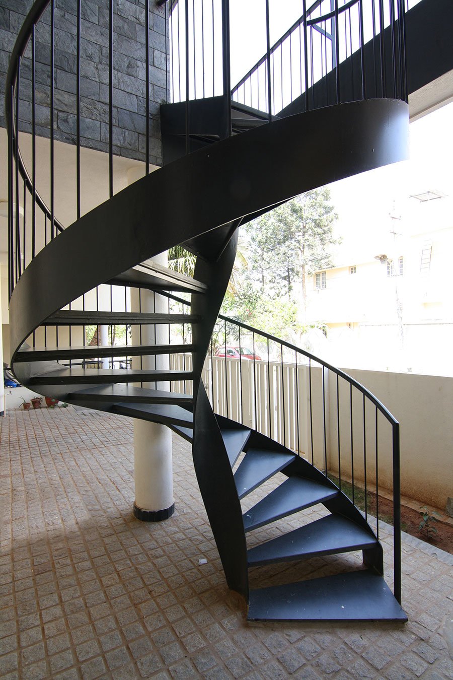 Wrought Iron Spiral Staircase design connecting two floors