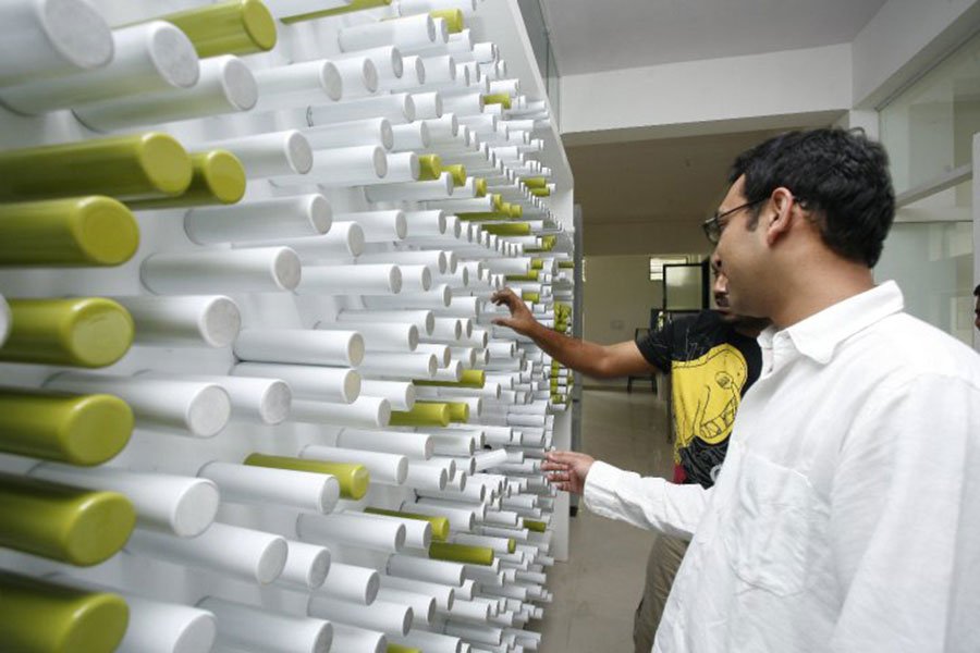 Office space design - creative can wall