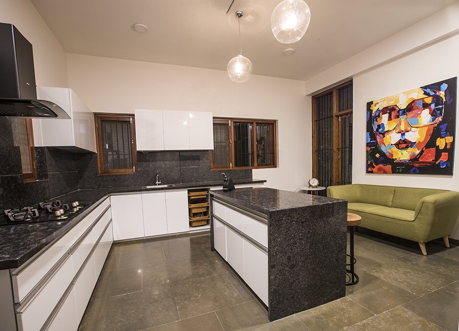 Kitchen island pitched house design